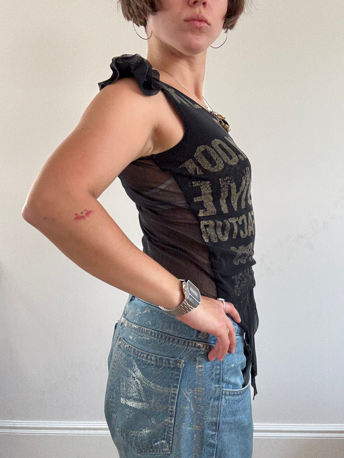 Black mesh vest with khaki lettering