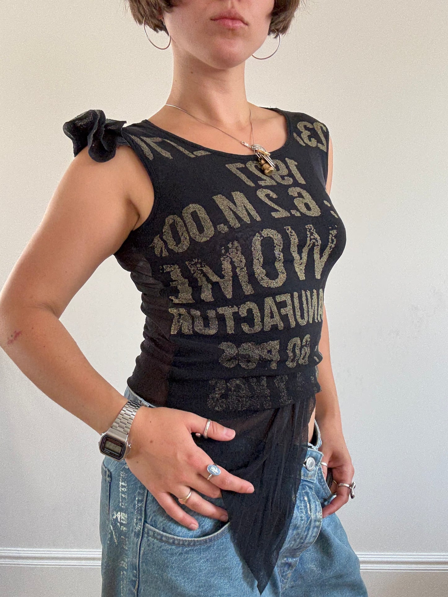 Black mesh vest with khaki lettering