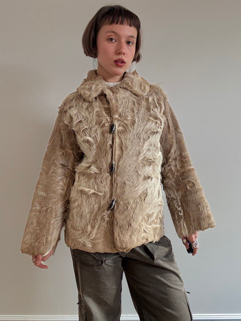 Light brown asymmetric ponyhair jacket