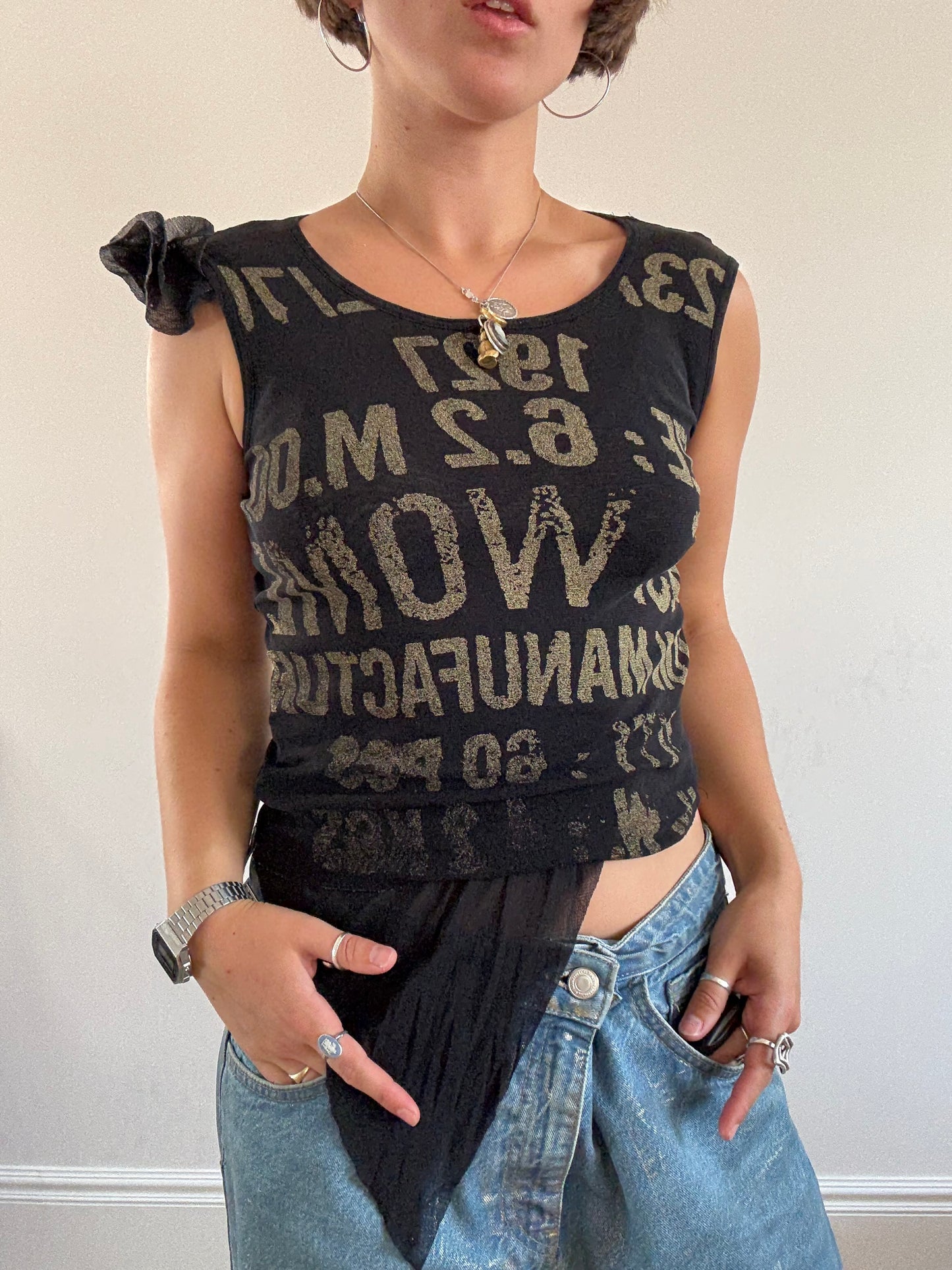 Black mesh vest with khaki lettering