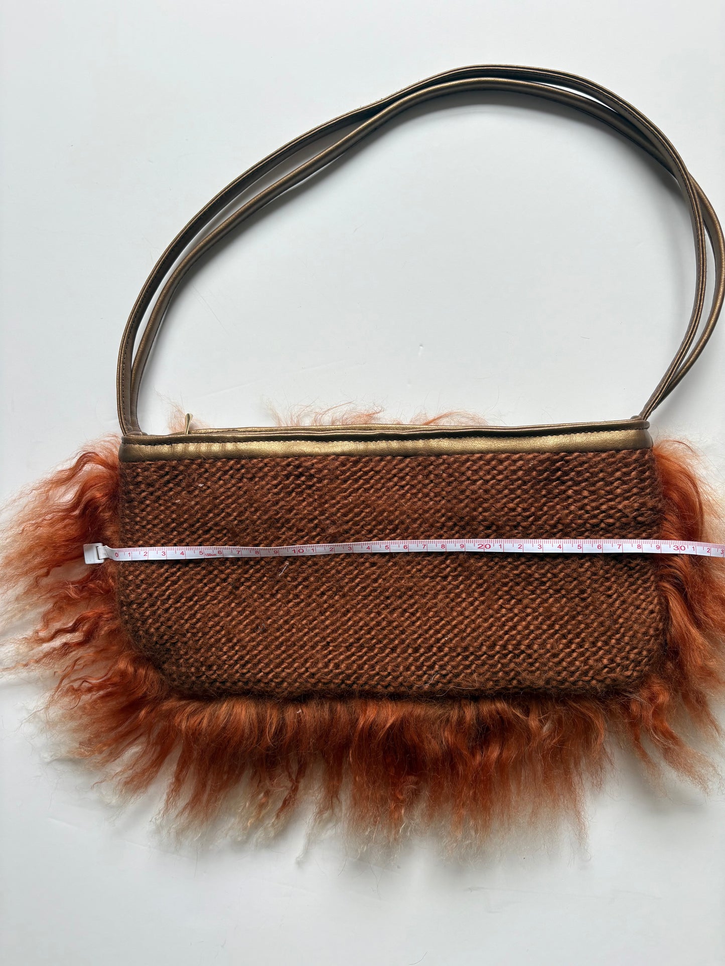 Orange mongolian fur shoulder bag
