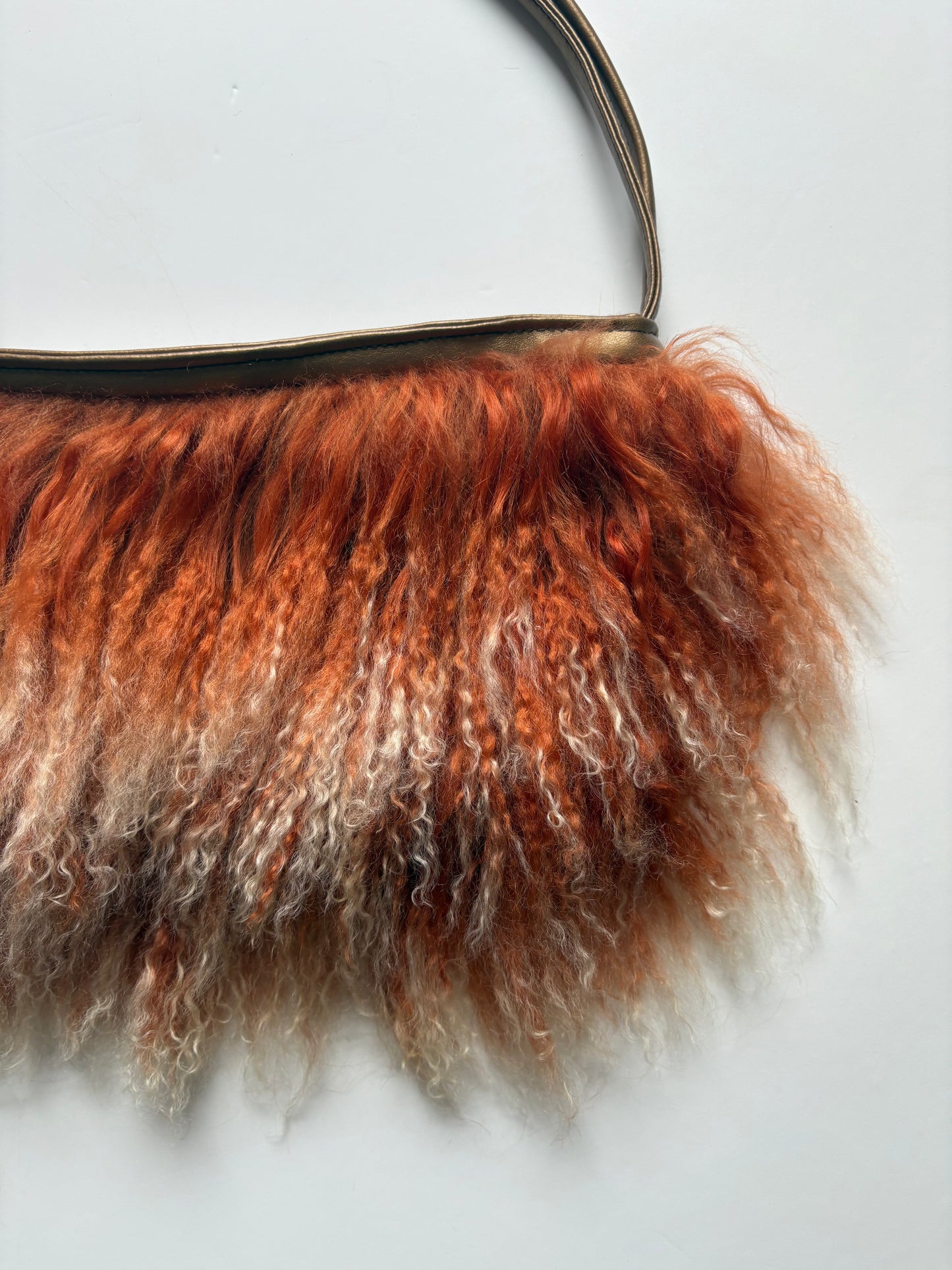 Orange mongolian fur shoulder bag