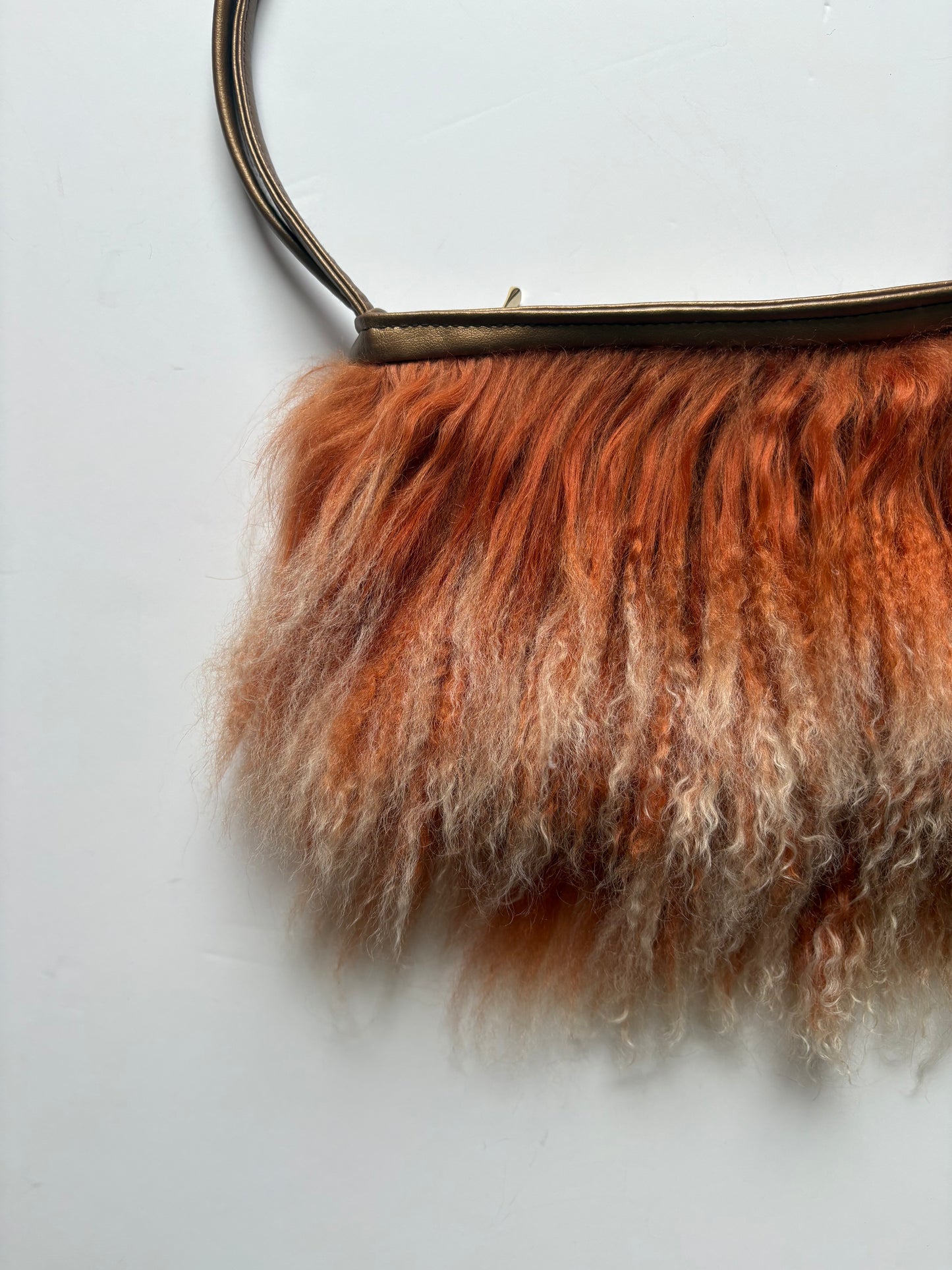 Orange mongolian fur shoulder bag