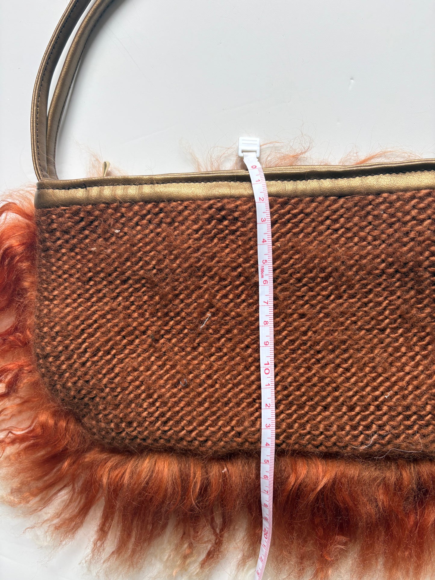 Orange mongolian fur shoulder bag