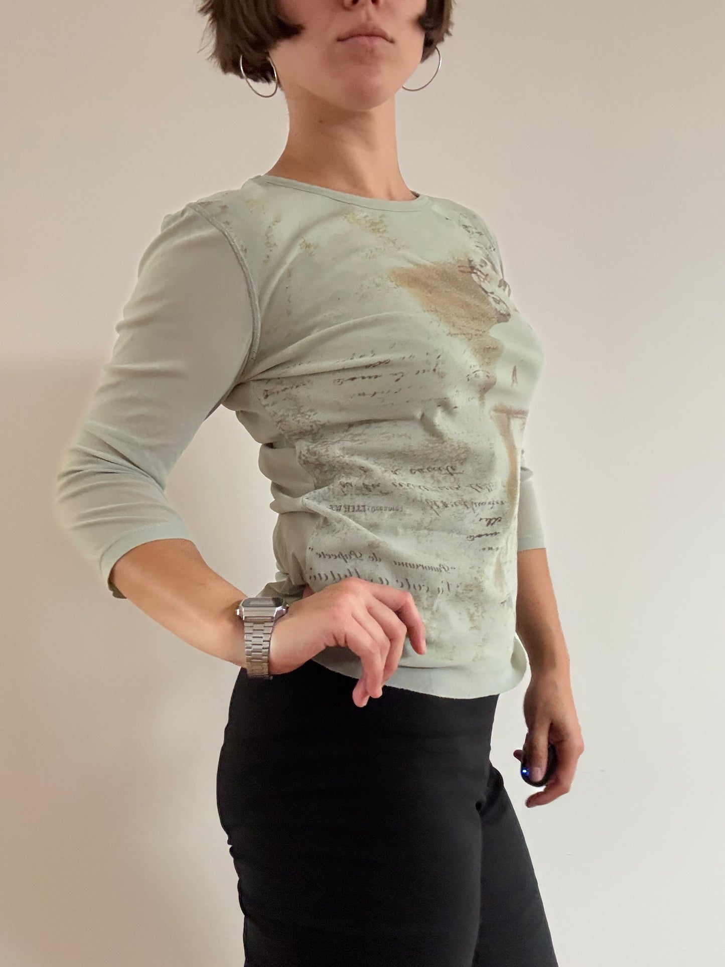 Light green mesh graphic top