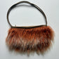 Orange mongolian fur shoulder bag