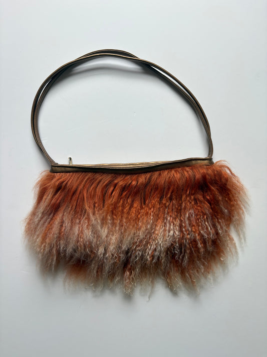 Orange mongolian fur shoulder bag