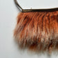Orange mongolian fur shoulder bag