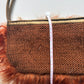 Orange mongolian fur shoulder bag